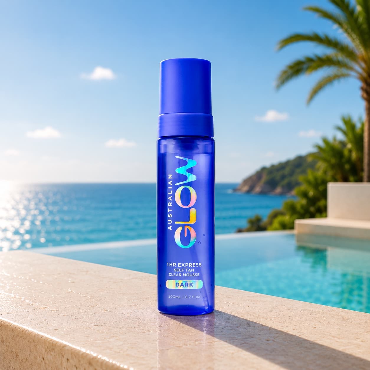 1HR Express Self Tan Clear Mousse in Dark, poolside above the ocean
